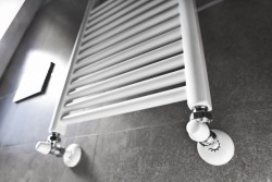 Hydronic Wall Heater - Alpine Heating and Cooling